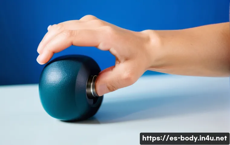 손목 통증 완화를 위한 운동 - 5kg dumbbell or a small water bottle) with their hand hanging off the table. They are slowly and con...